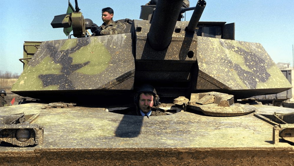 Sen. Mitch McConnell poses inside of a tank in 1985.